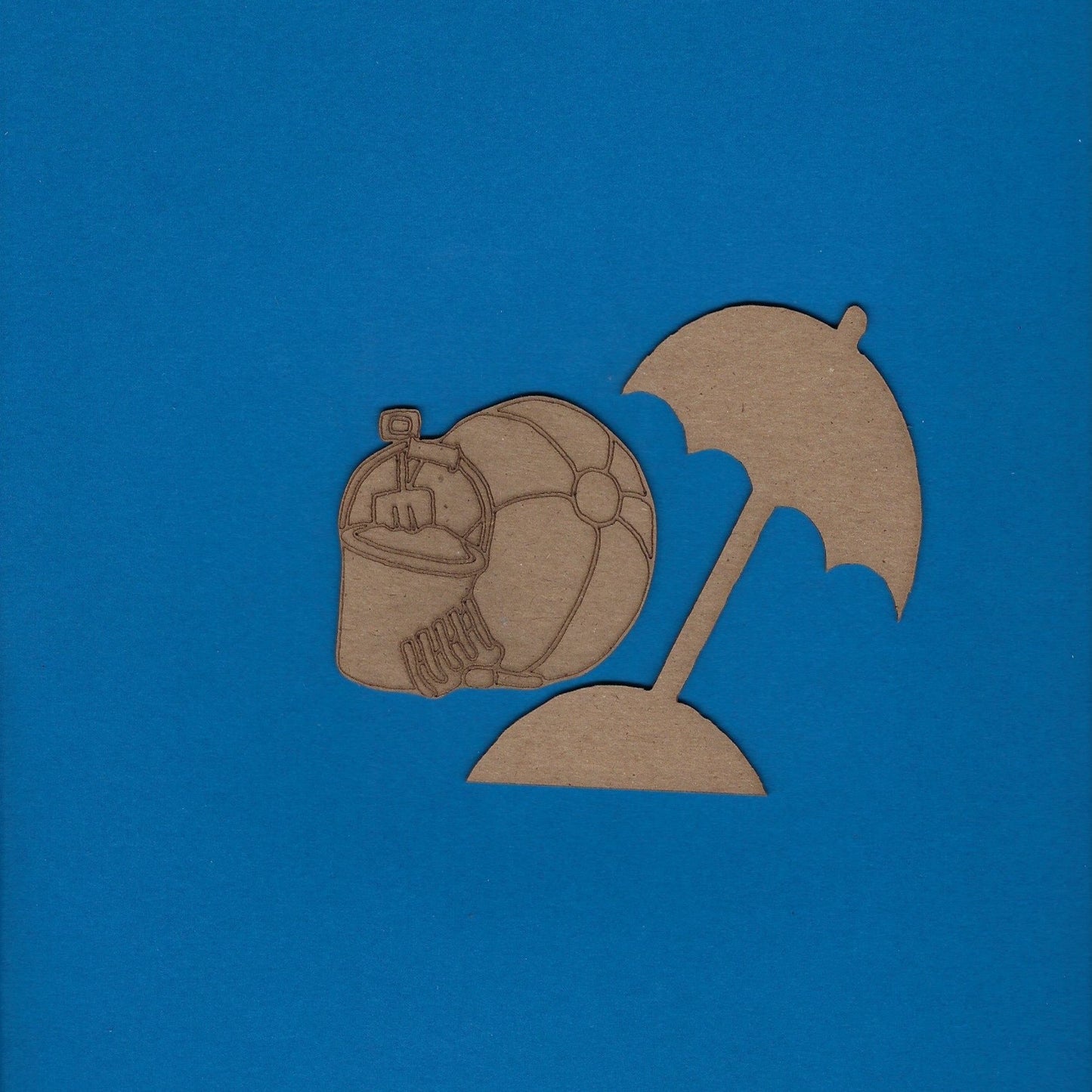 Beach ball and Pale (Umbrella In The Sand)